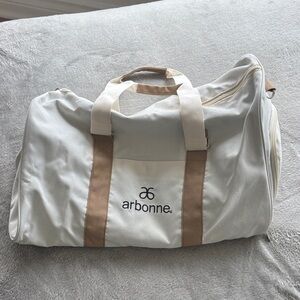 Arbonne White and Tan Duffel Bag